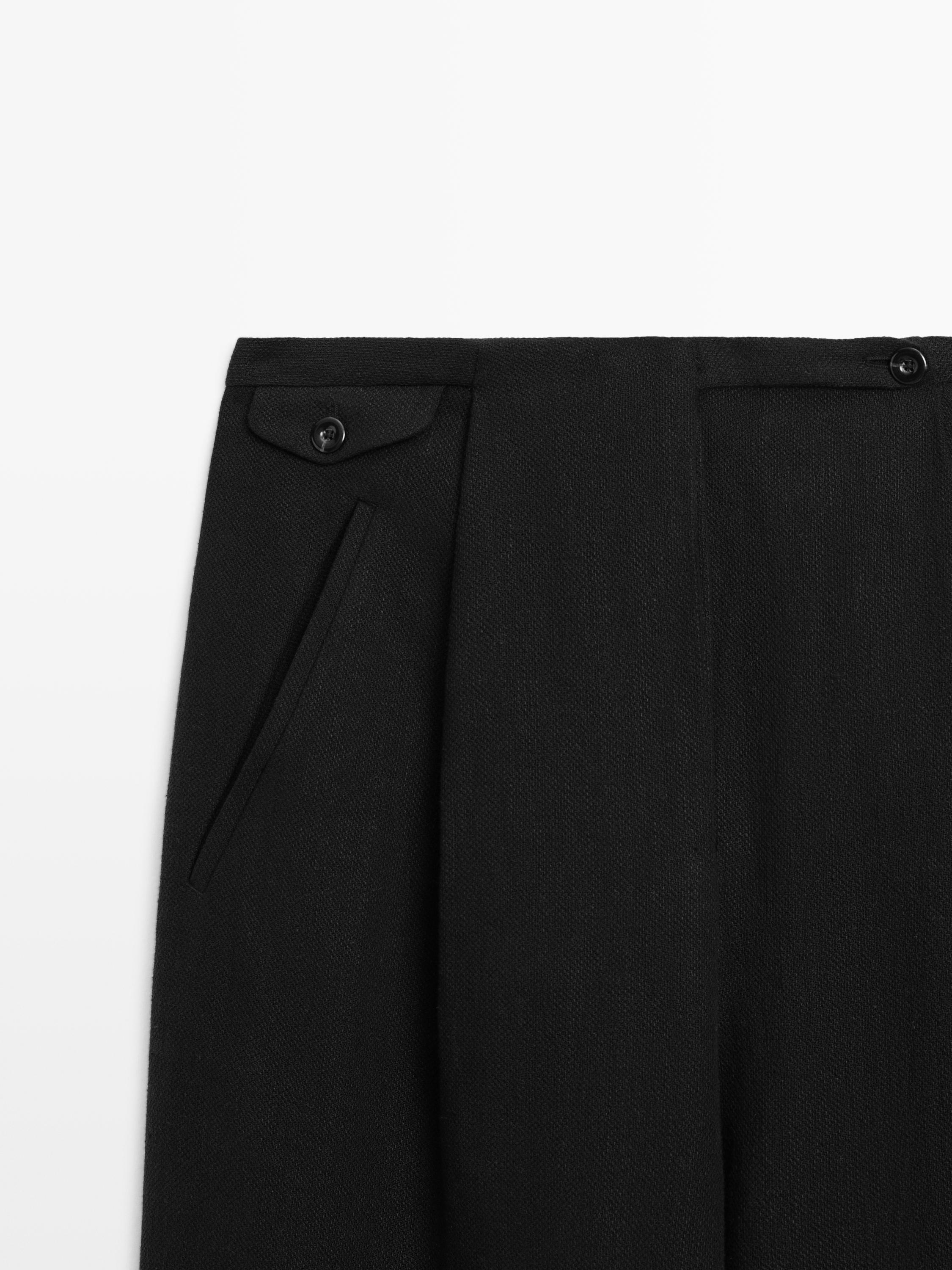 Flowing linen blend trousers with pocket details